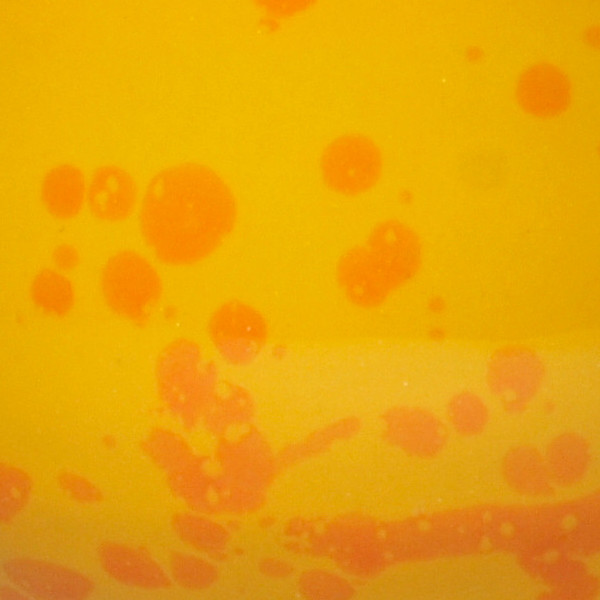 maisfarbene Glasur mit orangen Sprenkeln