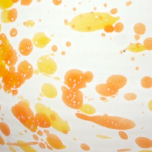 weiße Glasur mit orange-mais Sprenkeln